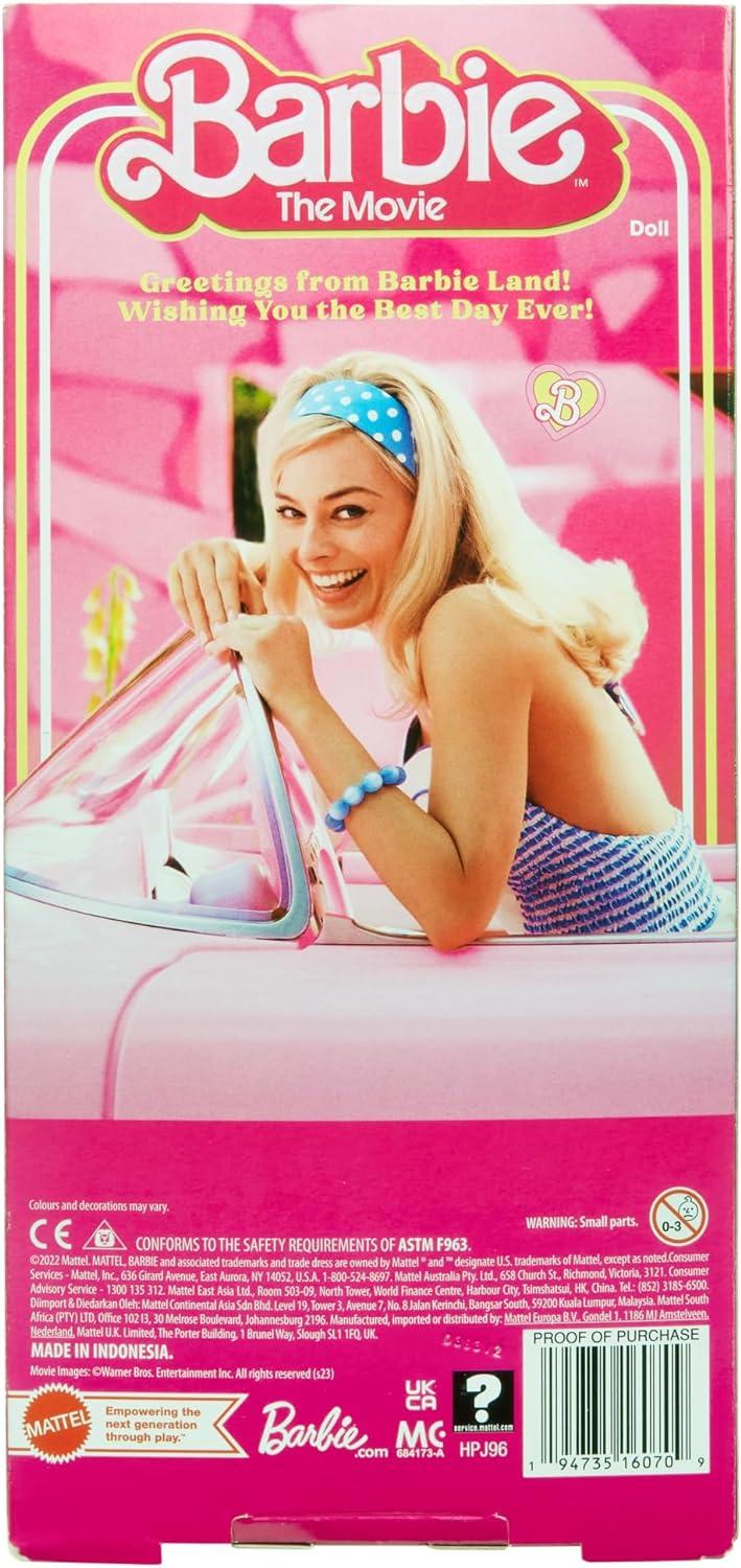 imageBarbie The Movie Doll Margot Robbie as Collectible Doll Wearing Pink and White Gingham Dress with Daisy Chain NecklaceModern