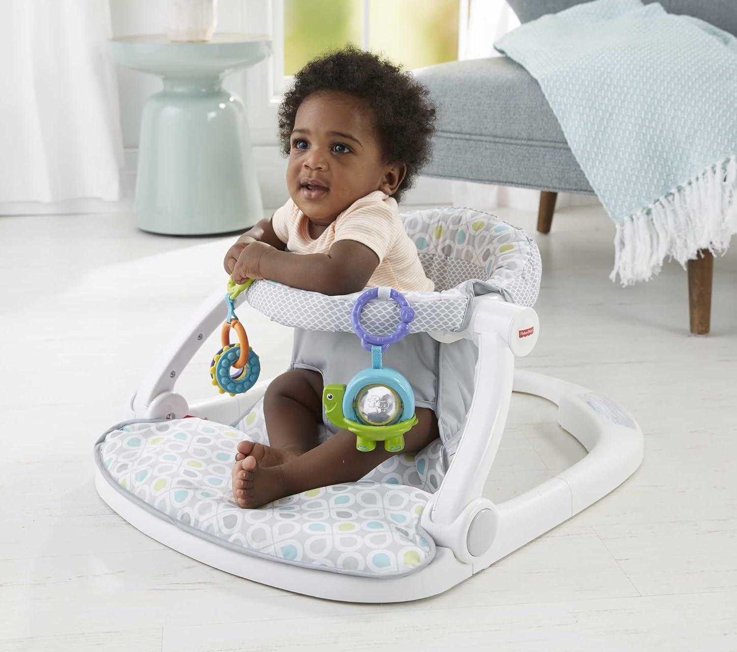 imageFisherPrice Portable Baby Chair SitMeUp Floor Seat With Developmental Toys ampamp Machine Washable Seat Pad Pacific Pebble1 Count Pack of 1